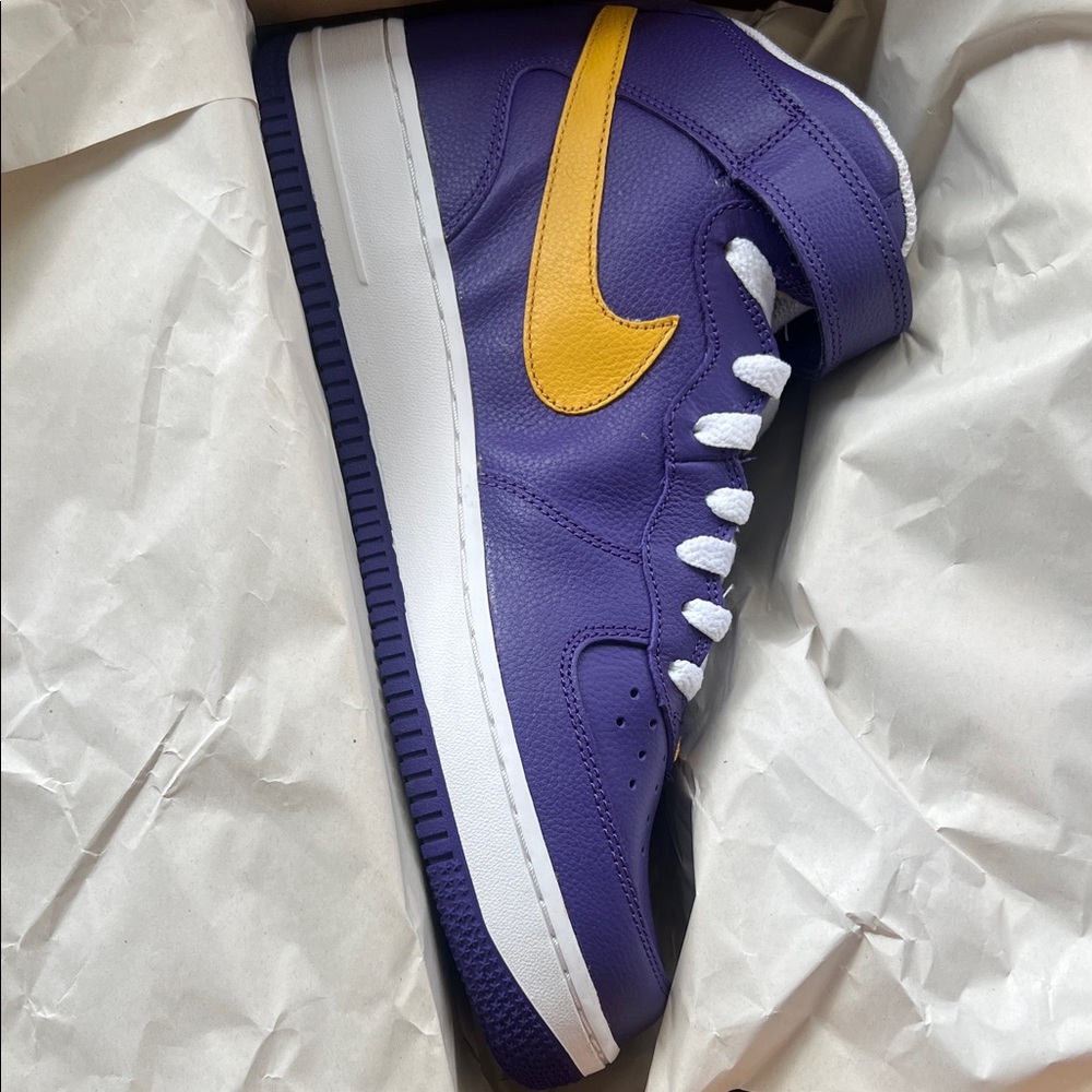 Nike Purple High-Top Sneaker with Yellow Swoosh and White Accents